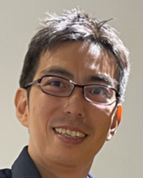 程塚 正史氏